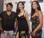 Actress and Brand Ambassador Feryna Wazheir on the red carpet at gala opening of London Indian Film Festival with music producer Rishi Rich and actress, Manrina Rekhi. Credit - Photos by O_Nitaa.jpg