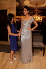 Amy billimoria_s long fluid drapes complimented the Tanishq line Inara in Mumbai on 27th July 2013  (1).jpeg