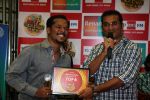 Singer Abhijeet Bhattacharya felicitates Nithin Raj (Trivandrum) , Top 6 contestant of _Benadryl Big Golden Voice_ reality singing hunt on 92.7 BIG FM.JPG