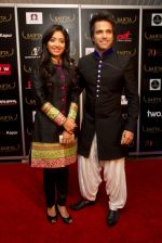 Rithivik Dhanjani and Asha Negi at Red Carpet of SAIFTA.jpg
