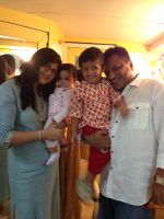 Anu Lekhi with daughter, son and husband and fillmaker Sanjay Gupta.jpg