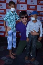 Vivek Oberoi at Big Cinemas Wadala with children from Cancer Patients Aid Association at a spl screening of Krrish 3 in Wadala, Mumbai on 2nd Nov 2013 (60)_527539cab2b48.JPG
