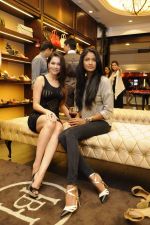 Carol Gracias & Waluscha Dsouza in Heel & Buckle shoes at Shamita Singha & Waluscha Dsouza Host Christmas Theme in Mumbai on 12th Dec 2013_52aab42f3ebb1.jpg