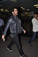 Anil Kapoor arrive back in Mumbai post new year celebrations in Mumbai on 2nd Jan 2014 (13)_52c6561df02ec.JPG