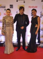 Karishma Kapoor, Vivek Oberoi with wife walked the Red Carpet at the 59th Idea Filmfare Awards 2013 at Yash Raj_52e399f31a3c1.jpg