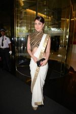 Kareena Kapoor snapped as she goes for an exclusive lunch hosted by Chhaya Momaya in honour oF FIRST LADY OF fRANCE Valerie Trierweiler in Mumbai on 27th Jan 2014 (19)_52e65a878294c.JPG