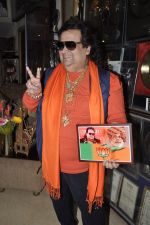 Bappi Lahiri plugs BJP at home in Mumbai on 21st March 2014 (25)_532cf54262a7a.JPG