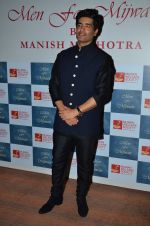 Manish Malhotra at the red carpet for Manish Malhotra Show Men for Mijwan in Mumbai on 1st April 2014  (169)_533bf1ca9e297.JPG