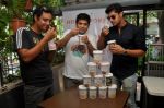 Olympian Swimmer Rehan Poncha, HP Founder Rohan Mirchandani, Actor Tanuj Virwani at the Launch of Hokey Pokey Ice-creams in Retail Packs on 26th April 2014 (4)_535e0389418a9.jpg