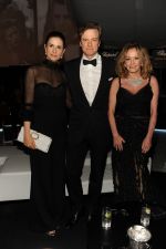 0519_PA_Livia_Firth_Colin_Firth_Caroline_Scheufele_at_Chopard_Backstage_party_537f2fc4d0f65.jpg