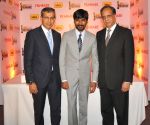 Mr. Tarun Rai (CEO, WWM), Dhanush & Mr. Rajat Mukarji (CCAO, Idea Cellular) at the _61st Idea Filmfare Awards 2013_ Press Conference at Park Hyatt Hotel, Chennai.5_53a39439dcf44.JPG