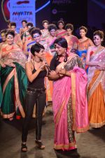 Sunil Grover, Mandira Bedi walk the ramp for Mandira Bedi Show on day 3 of Myntra fashion week on 5th Oct 2014 (431)_543141aed9668.JPG