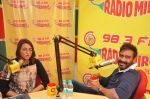 Sonakshi Sinha & Ajay Devgn at Radio Mirchi Mumbai studio for the promotion of upcoming movie Action Jackson_547ea48dcddaa.JPG
