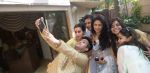Bappa Lahiri clicks a selfie with wife Tanisha, Agam Pandit, Kavita Kaushik, Nivedita Basu and Sumona Chakravorty at Bappi Lahiri_s Saraswati Puja_54c61346bc761.jpg