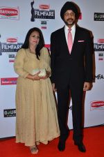 NP Singh with wife graces the red carpet at the 60th Britannia Filmfare Awards_54cf5ba0c8df3.JPG