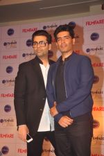 Manish Malhotra, Karan Johar at Filmfare & Ciroc Cover Launch of Glamour & Style Awards Issue in Enigma on 30th March 2015 (29)_551a49d54b492.JPG
