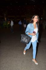 Neha Dhupia snapped at international airport on 10th June 2015 (10)_55795a299f03d.JPG