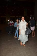 Neha Dhupia snapped at international airport on 10th June 2015 (3)_55795a2158137.JPG