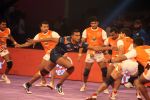 Mahendra Rajput (Bengal Warriors) attempts a running hand touch on the Puneri Paltan defence _55ba0c5bdf79d.jpg