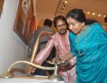 Artist Paramesh Paul with Asha Bhosle as Asha ji checks out an installation at Paramesh_s art show inauguration_55d43293db9d2.jpg