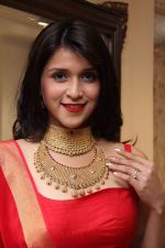 MANNARA CHOPRA IN SIZZLING RED LAUNCHES VADDANAM & UNCUT DIAMOND MELA AT MANEPALLY JEWELLERS (11)_56690d2df18df.jpg