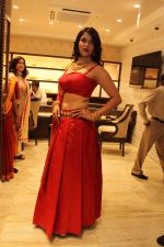 MANNARA CHOPRA IN SIZZLING RED LAUNCHES VADDANAM & UNCUT DIAMOND MELA AT MANEPALLY JEWELLERS (3)_56690ca5b862e.jpg