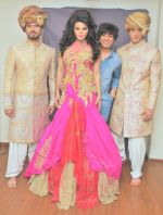 Rakhi Sawant with Rohit Verma and Avadhoot Nichkawde (Australian Model) at the launch of Rohit Verma_s new collection on 24th Jan 2016_56a5d046cf5f2.JPG