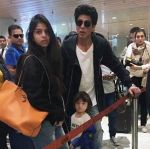 Shahrukh Khan with abram in Mumbai airport on 27th May 2016_57493cf87691e.jpg