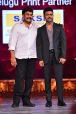 Chiranjeevi with son Ram Charan on stage at the Maa awards in HICC Hyderabad on 12th June 2016 (2)_575ee703e8d2e.jpg