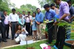 Deepika Padukone, brand ambassador of India�s no.1 sugar free chewing gum Orbit  takes a photo of the mango tree sapling she planted at the Wrigley India factory, the �Home of Orbit� in Bangalore on August 5, 20_57ab3b5d78f3a.jpg