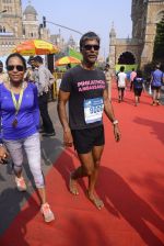 Milind Soman at Mumbai Marathon Event in Mumbai on 15th Jan 2017 (55)_587b6af06e1f2.JPG
