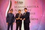 Mr Patil and Mr Kaushik present the Best Entrepreneur Award to Pradeep Rathod of the group at ET Edge Maharashtra Achievers Awards 2018 (1)_5a980a2a02738.JPG