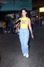 Ananya Panday in a Yellow tank top and blue jeans on 23rd May 2023 (24)_646e18d819405.jpg