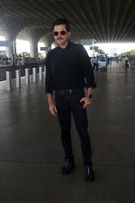 Anil Kapoor dressed in black with shades at the airport on 19th May 2023 (1)_646da920ee63b.jpg