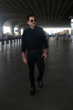 Anil Kapoor dressed in black with shades at the airport on 19th May 2023 (11)_646da966f2879.jpg