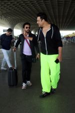 Krushna Abhishek in a black laced coat and fluorescent green pants and black sneakers (11)_64718da4f2fa5.jpg