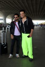 Krushna Abhishek in a black laced coat and fluorescent green pants and black sneakers (9)_64718d9f616fc.jpg
