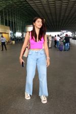 Pooja Hegde in a pink sleeveless top and blue jeans holding a Saint Laurent Niki Medium Linen shoulder bag and Bottega Veneta Flash leather trimmed stretch slides (5)_6471947b84ba3.jpg