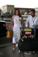 Shriya Saran in a white dress, pink coat design, holding Lady Dior Cannage two-way bag, Gucci Metallic Gold Textured Leather GG Marmont Fringe Detail Heel Pumps (3)_64718a7ed31c4.jpg