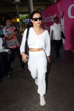 Malaika Arora in white wearing dark glasses white sneakers and holding black Chanel Bag  (7)_6474476b78f02.jpg