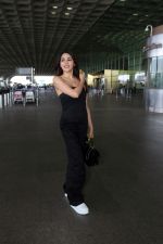 Nikki Tamboli wearing all black strapless bodycon dress, white sneakers holding Tamboli holding Chanel Black Quilted Lambskin Small Trendy Top Handle Flap Bag (12)_64746e043c27e.jpg