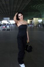 Nikki Tamboli wearing all black strapless bodycon dress, white sneakers holding Tamboli holding Chanel Black Quilted Lambskin Small Trendy Top Handle Flap Bag (16)_64746e63ecfea.jpg