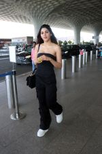Nikki Tamboli wearing all black strapless bodycon dress, white sneakers holding Tamboli holding Chanel Black Quilted Lambskin Small Trendy Top Handle Flap Bag (2)_64746dc059c87.jpg