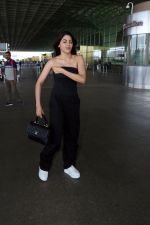 Nikki Tamboli wearing all black strapless bodycon dress, white sneakers holding Tamboli holding Chanel Black Quilted Lambskin Small Trendy Top Handle Flap Bag (4)_64746dd1c47e4.jpg