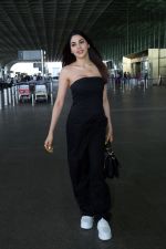 Nikki Tamboli wearing all black strapless bodycon dress, white sneakers holding Tamboli holding Chanel Black Quilted Lambskin Small Trendy Top Handle Flap Bag (7)_64746de81373a.jpg