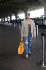 Gauahar Khan holding Villette Tote Bag wearing Gazelle Gucci Mesa White Red shoes, Balmain distressed effect finish jeans, overcoat and sunglasses (7)_6475d340e36c5.jpg