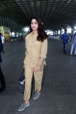 Janhvi Kapoor holding Tas Goyard Saint Louis PM Tote handbag wearing light brown shirt and wide pants and Meya light green genuine suede leather loafer shoes (10)_6475d060b9980.jpg