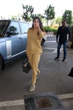 Janhvi Kapoor holding Tas Goyard Saint Louis PM Tote handbag wearing light brown shirt and wide pants and Meya light green genuine suede leather loafer shoes (3)_6475cff47d31e.jpg