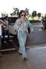 Rhea Chakraborty dressed in Jeans jacket and pant wearing dark glasses and black sandals (3)_6475d95320c44.jpg