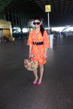 Urvashi Rautela dressed in a pink and orange floral dress spotted at airport on 14 Jun 2023 (2)_6489cf6dc0646.jpg